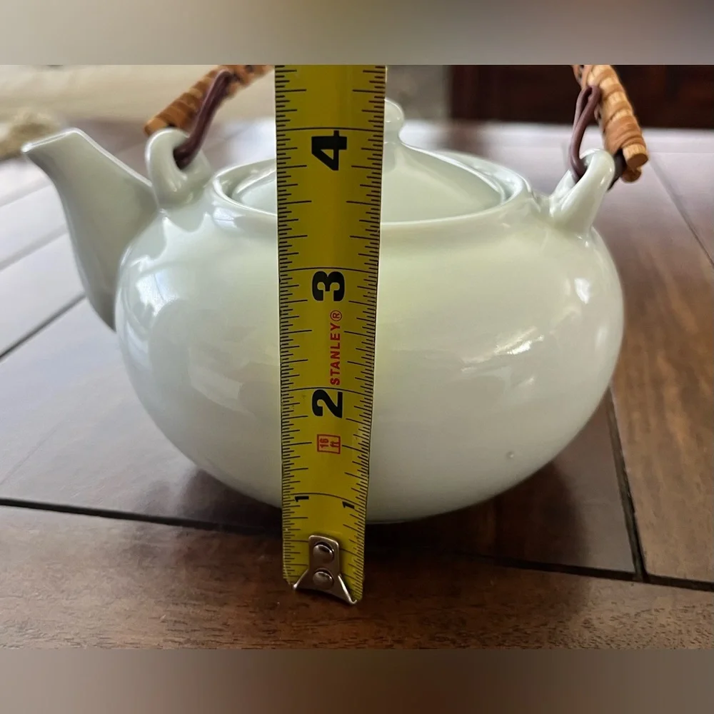 Elegant Ceramic Teapot with Woven Handle